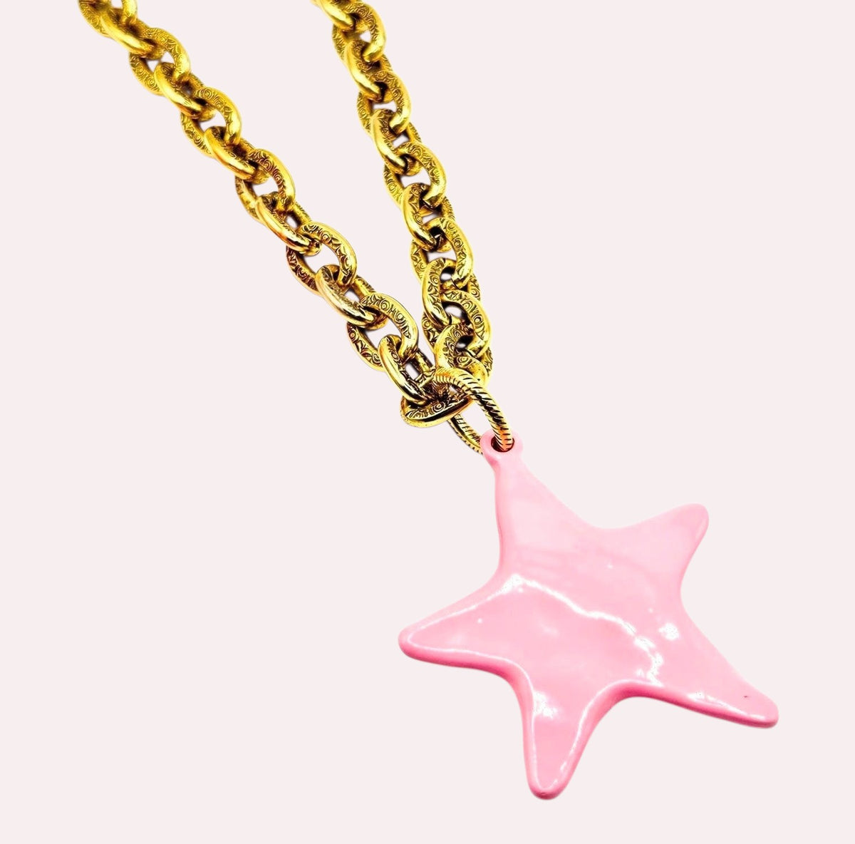 Blue River Boho handmade gold-tone chain necklace featuring an antique style pink enamel star pendant.
